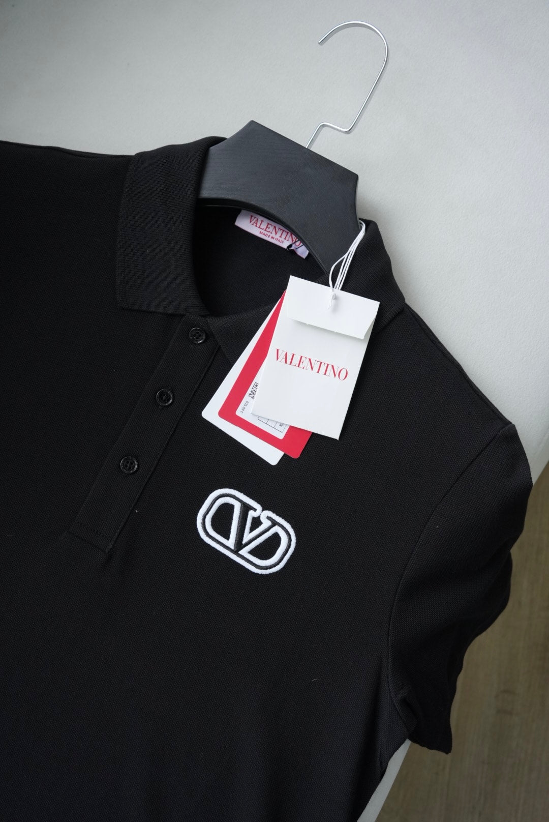 VLTN black polo