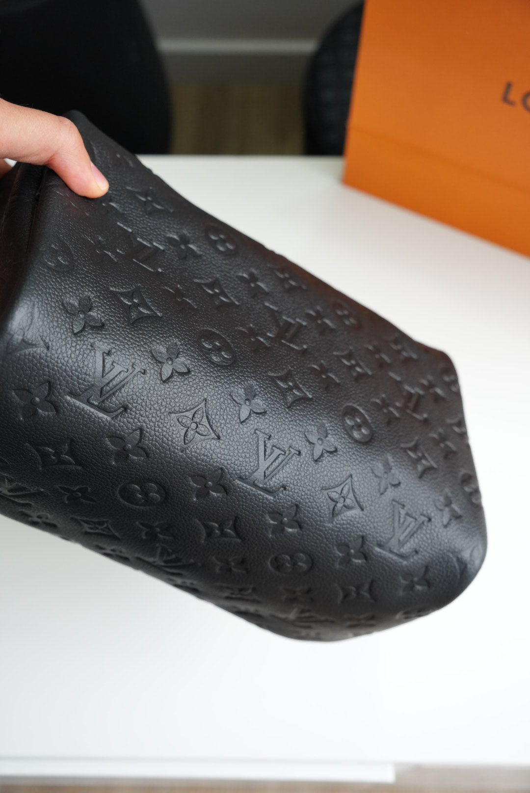LV embossed neceser