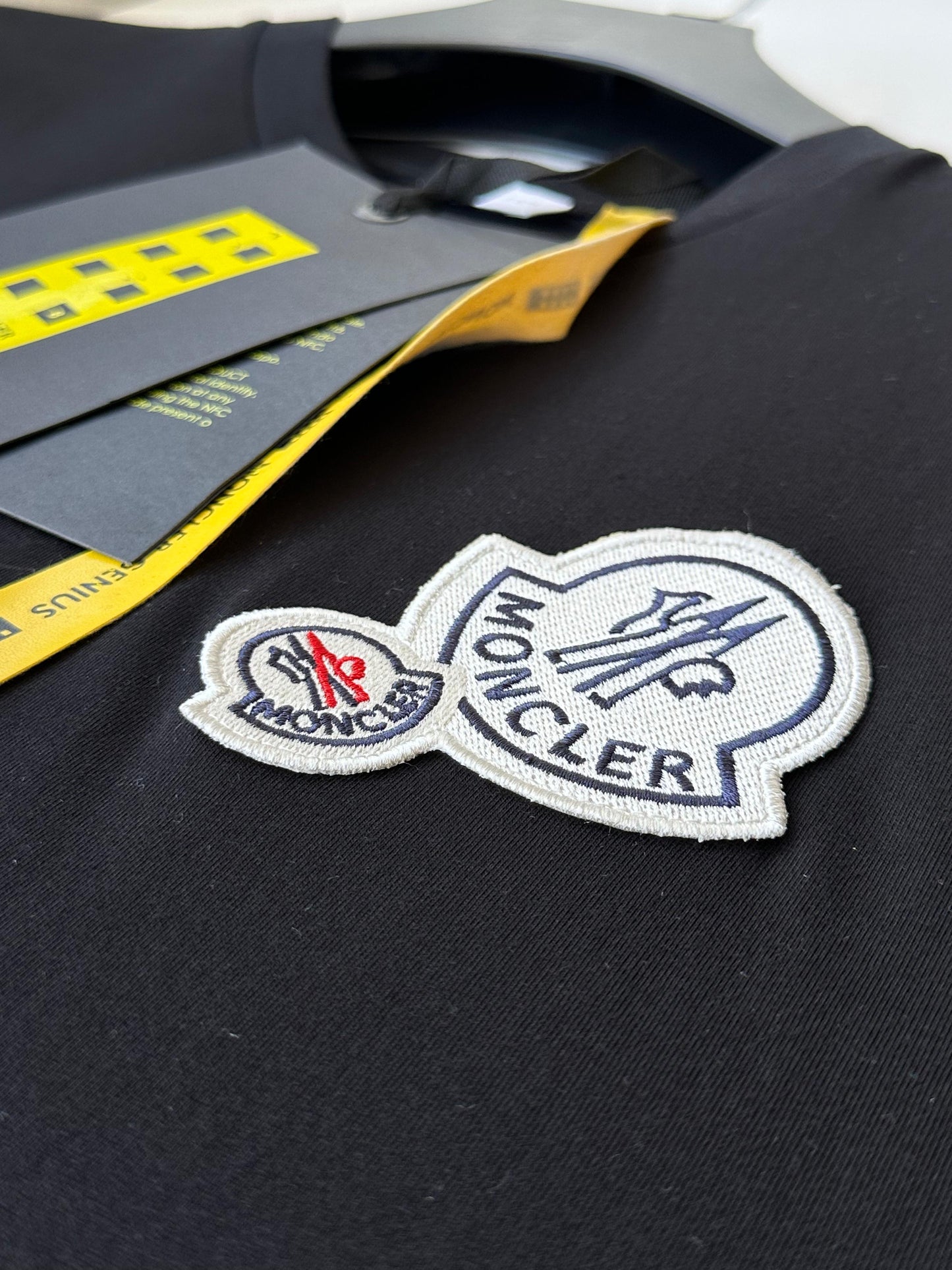 Moncler patch logos
