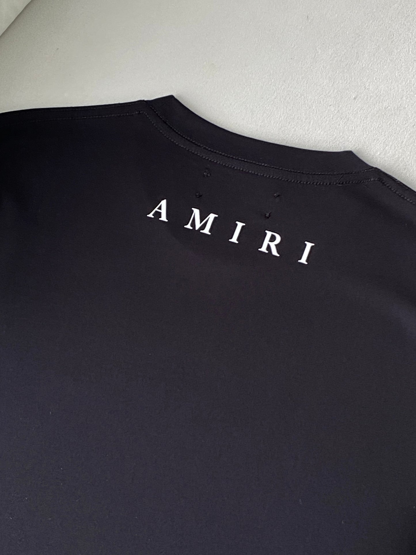 Amiri minimal logo