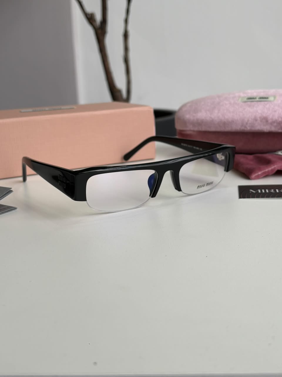 Gafas MIU MIU