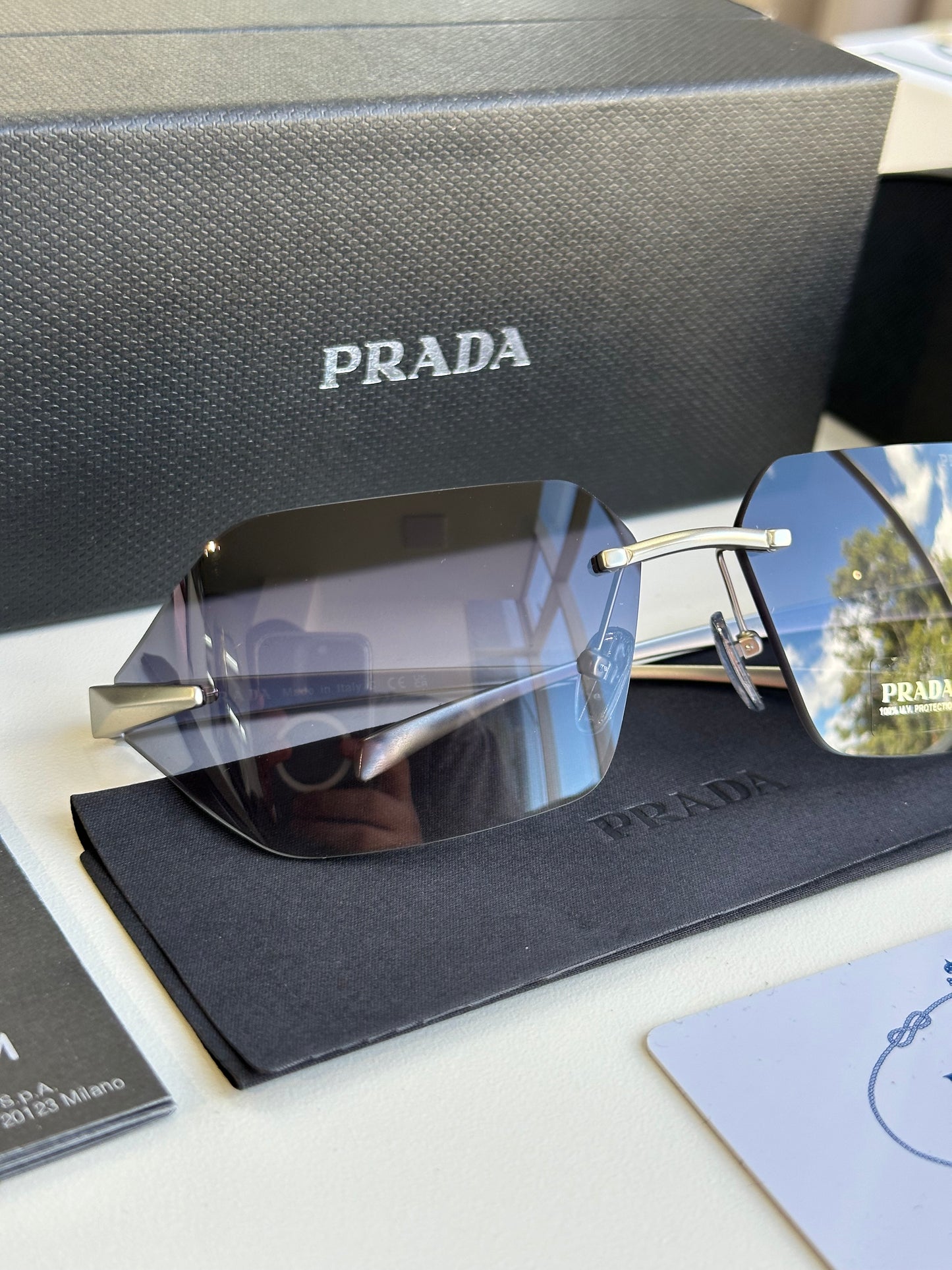 Prada curved sunglasses