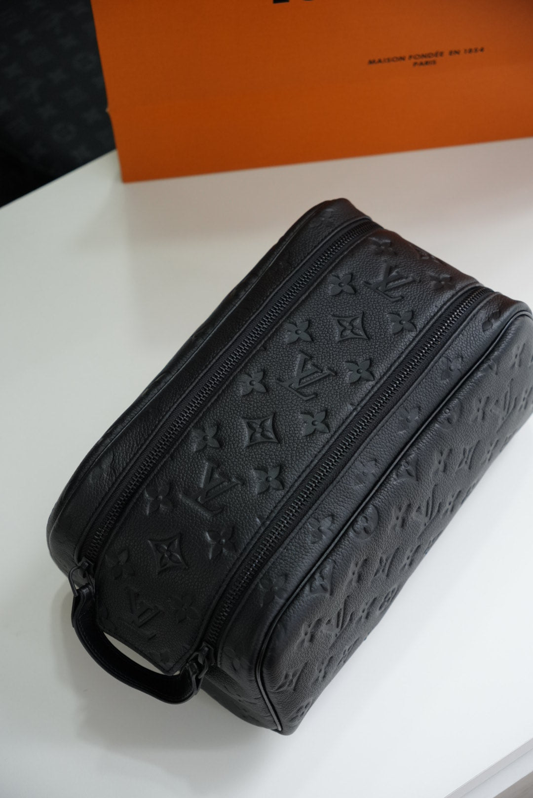 LV embossed neceser