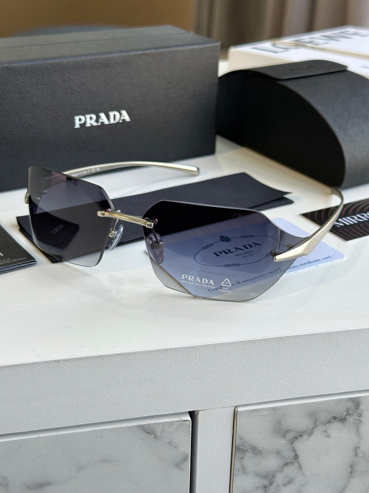 Prada curved sunglasses