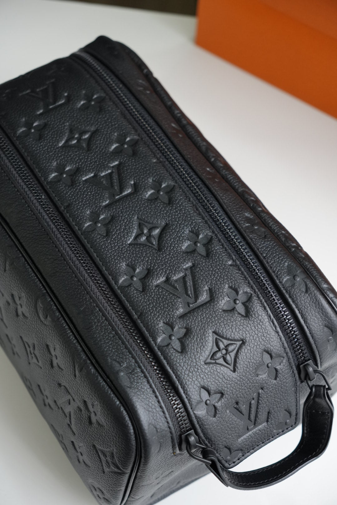 LV embossed neceser