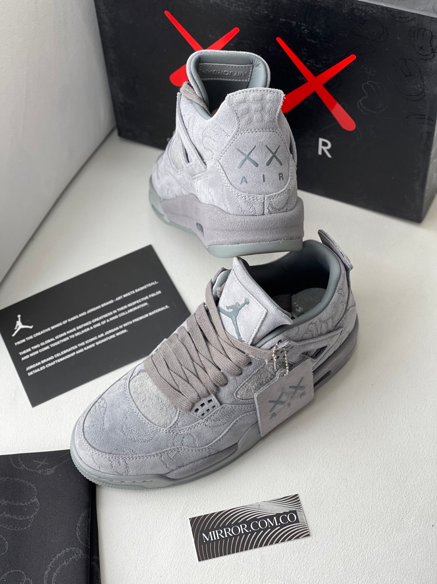 Jordan 4 x kaws gray