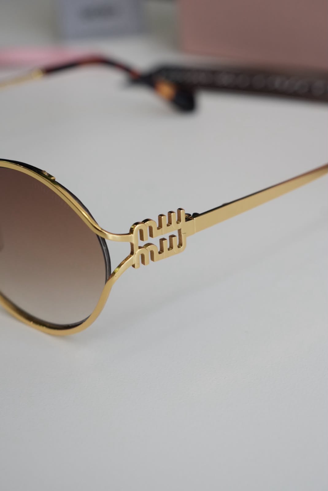 Gafas MIU MIU