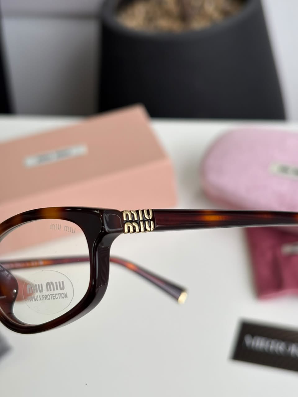 Gafas MIU MIU